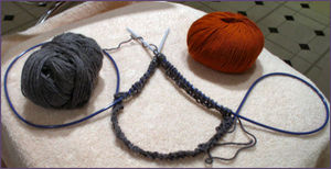 Hat begun using long circular needle method